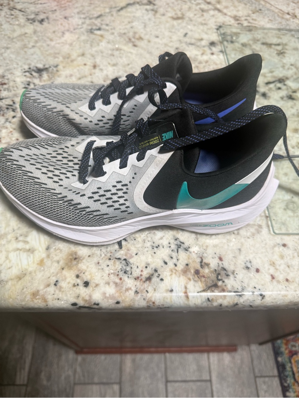 Nike women’s Gray & Teal Running Shoes